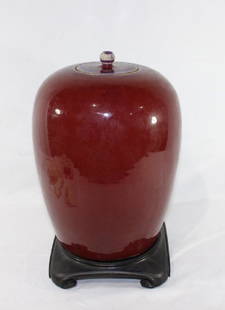 Antique Chinese Oxblood Vase/ Jar w/ Lid: Antique Chinese Oxblood Vase/ Jar w/ Lid- Paper work letters included possibly date this to no earlier than 19th century. Very good condition and included stand. Measures approx 12" tall and 28.5" rou