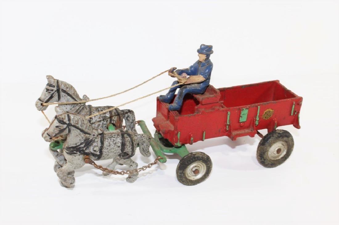 Arcade McCormick Cast Iron Horse and Wagon (1 of 2)