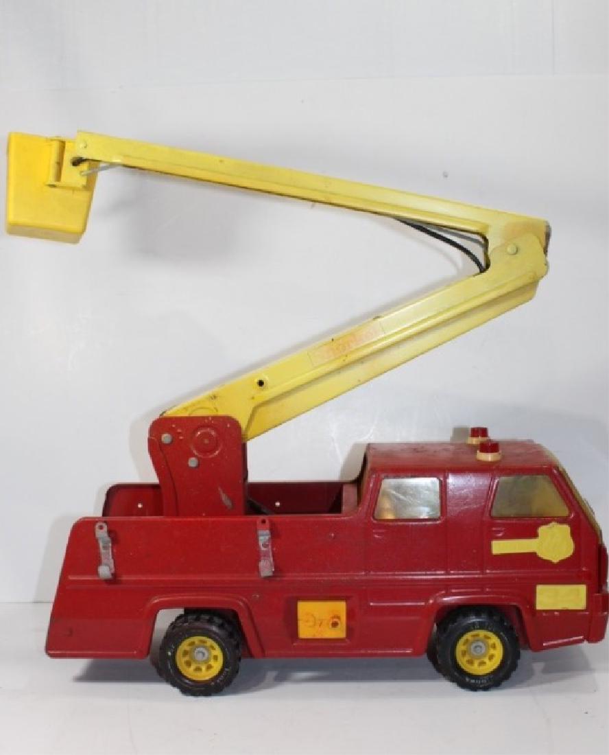 Vintage Tonka Snorkel toy truck: Has been repainted-Roughly 16 inches long/ 6.5 inches high-MIssing accessories