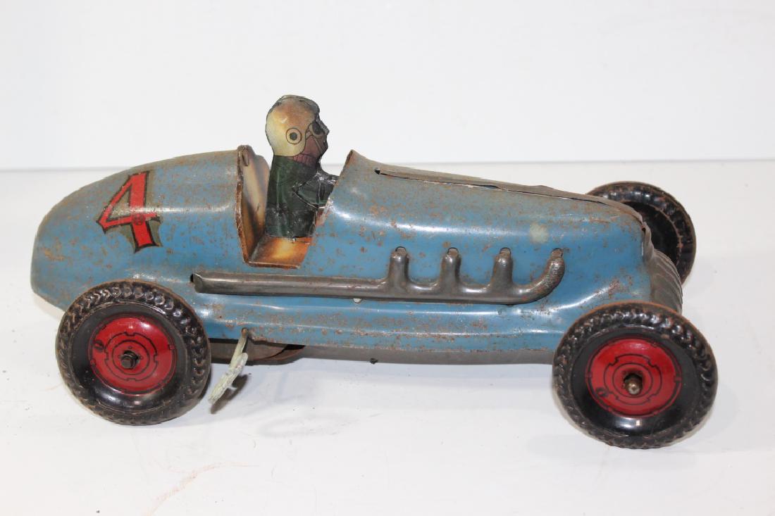 Vintage aluminum wind up car-#4: Some wear and tear-minor rusting-Does not work/Roughly measures 12 inches long-Roughly 6.5 high
