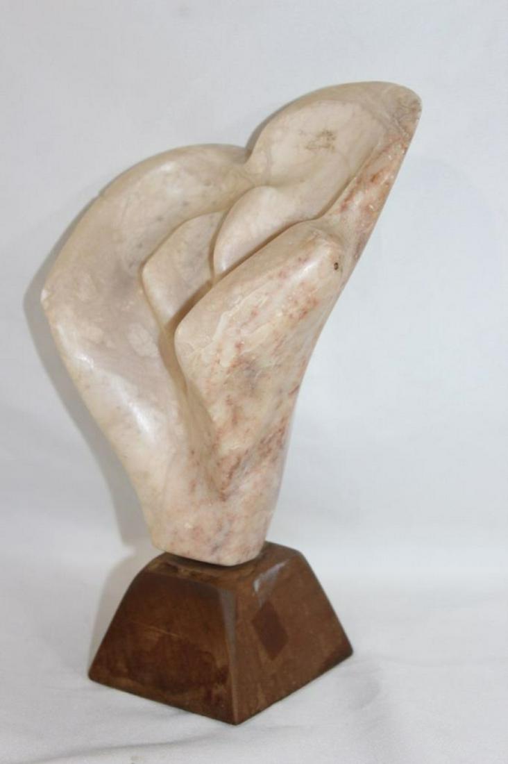 Hand carved rose stone sculpture on wooden base: Hand carved rose stone sculpture on wooden base-Roughly measures 11 inches tall and 3 inches wide at the base