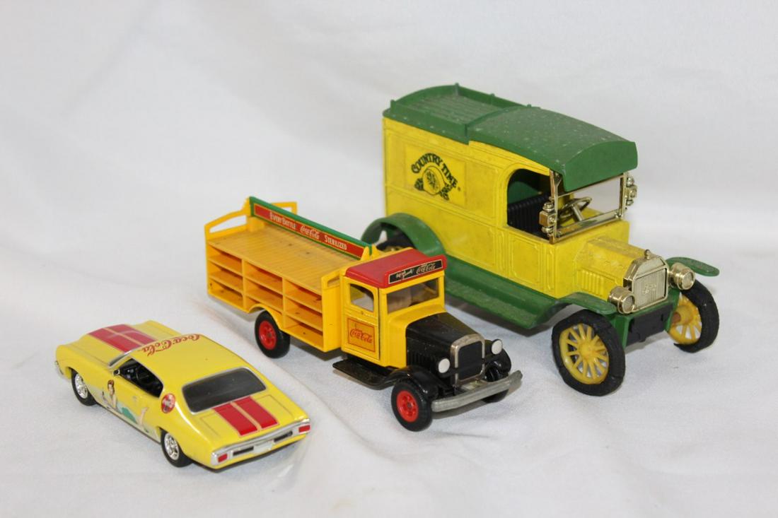 Lot of three advertising toy cars (1 of 3)
