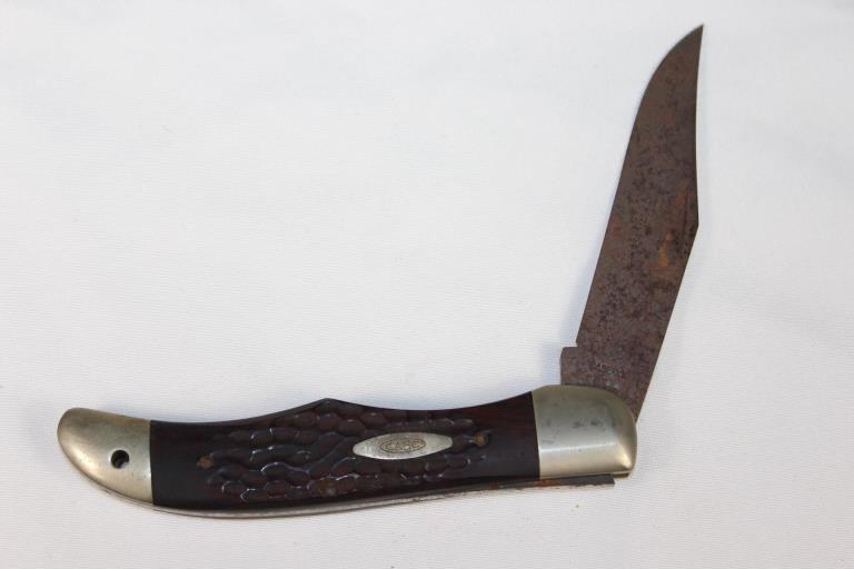 Case XX Knife Large Folding Hunter Knife: measures about 5 1/4 inches long when folded, rusty blade on one side as pictured