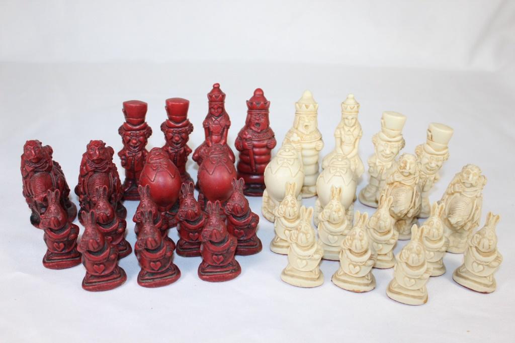 Disney Alice in Wonderland Chess Pieces: Red and white chess pieces with characters from Alice in Wonderland, peices measures about 1" to 3" inches tall
