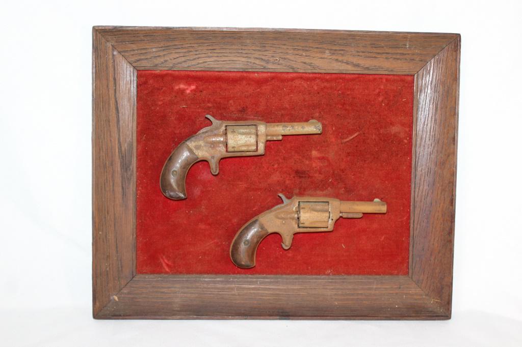 Antique Bird Grip Pistol Wall Hanger: Deactivated pair of wall hanger bird grip guns