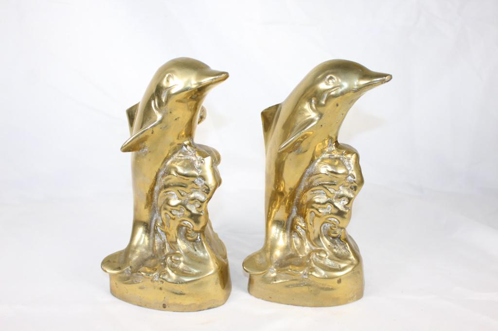 Pair of MCM Dolphin Bookends: Dolphins on waves vintage bookends, measures about 9 inches tall