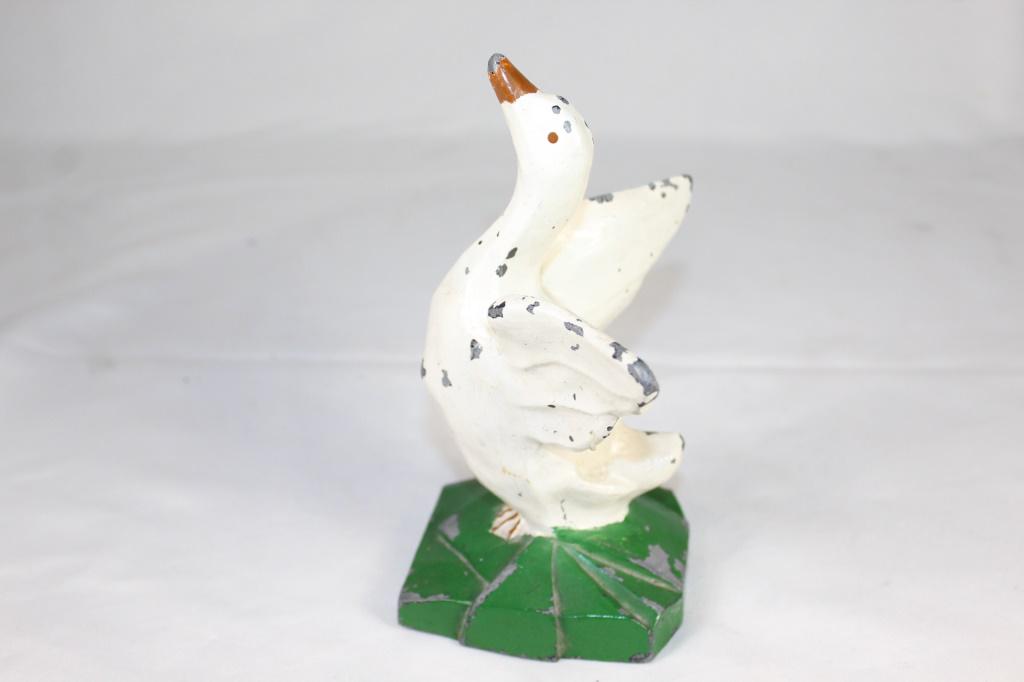 Rare - Antique Metal Duck Door Stop: early metal duck door stop, some paint loss as pictured, measures about 7 1/2 inches tall by 6 inches wide
