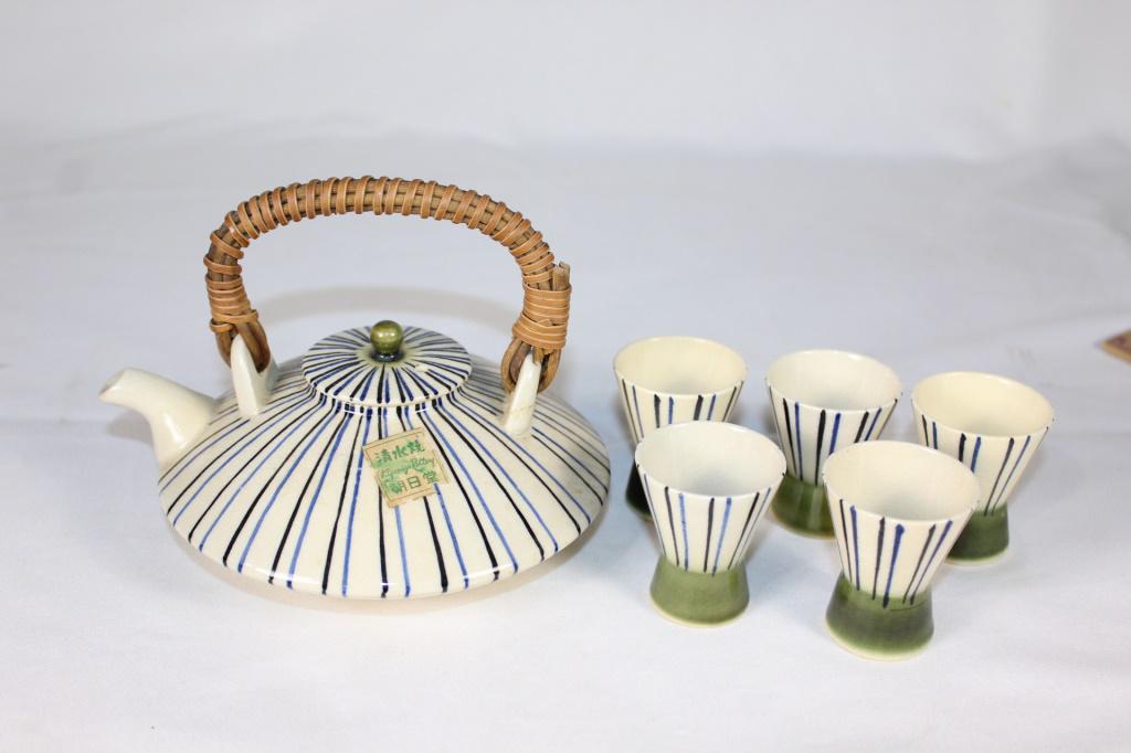 Vintage Kiyomizu Pottery Tea Sett with paper Label: Triped vintage Tea Pot with 5 cups, with original Kiyomizu Pottery Paper Label, teapot and cups have crazing due to age, no chips or cracks seen