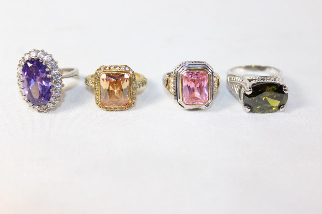 Costume Jewelry Lot of 4 Rings: Gold and Silver Colored Rings with Pink, Purple, Green and Yellow Rhinestones, as pictured