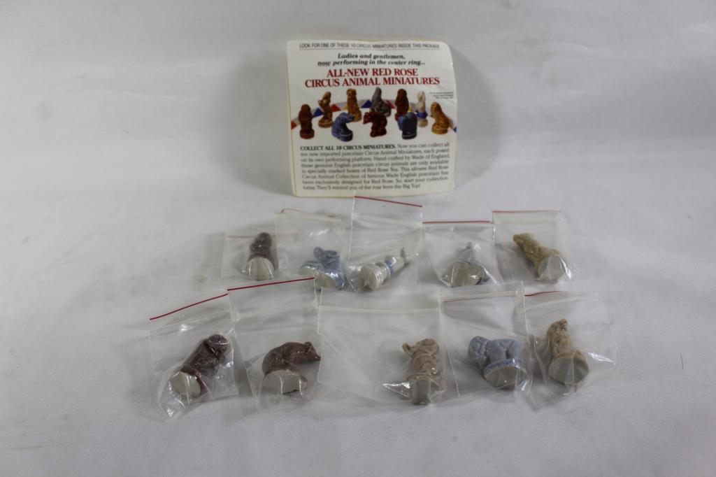 10 RED ROSE CIRCUS ANIMAL MINIATURES: RED ROSE TEA COLLECTION OF WADE ENGLISH PORCELAIN. ALL 10 FIGURINES INCLUDING BOX CUT OUT AD. AS PICTURED.