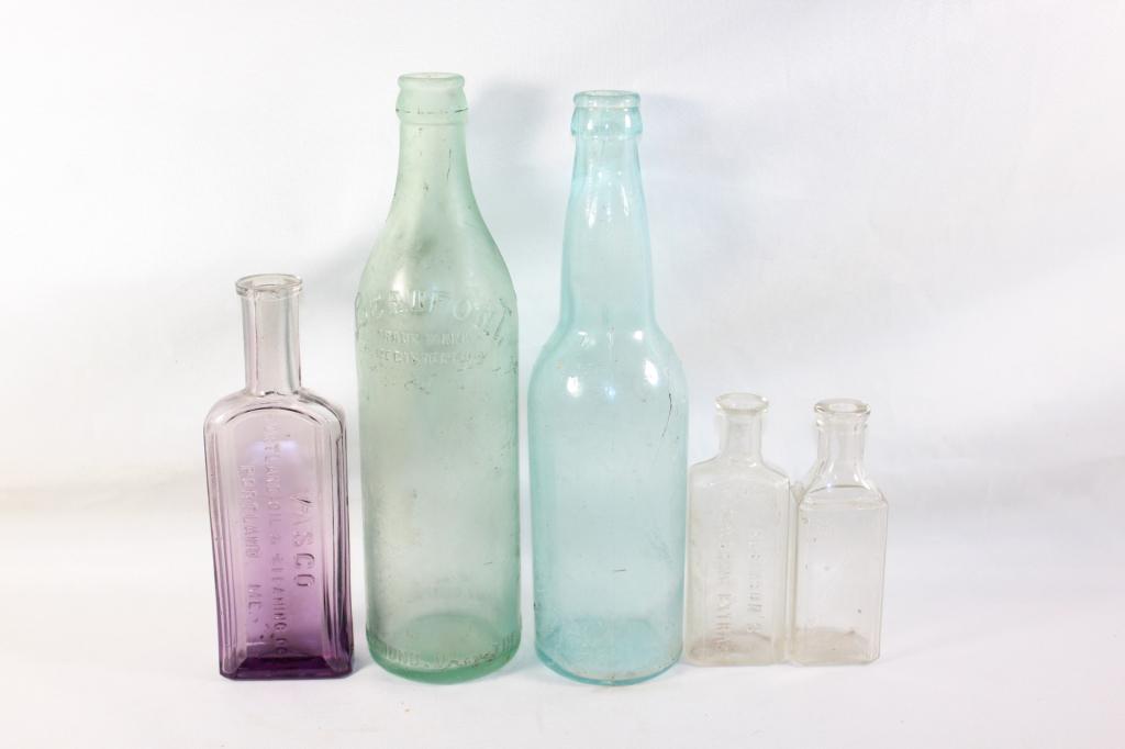5 PC. MISC. GLASS BOTTLE LOT-VASCO, BEAUFONT, ETC: VASCO PURPLE AND CLEAR BOTTLE, MEASURES APPROX. 7 BY 3 INCHES BEAUFONT GLASS BOTTLE-;MEASURES APPROX. 10 BY 3 INCHES. A. B. CO. GLASS BOTTLE- MEASURES APPROX10 BY 3 INCHES ROBINSON'S FLAVORING EXTRACT