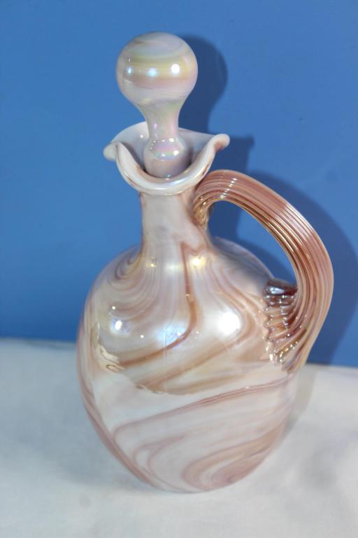 GIBSON ART GLASS IRIDESCENT CARAMEL SLAG CRUET: MEASURES APPROX. 7 BY 4 INCHES. AS PICTURED.