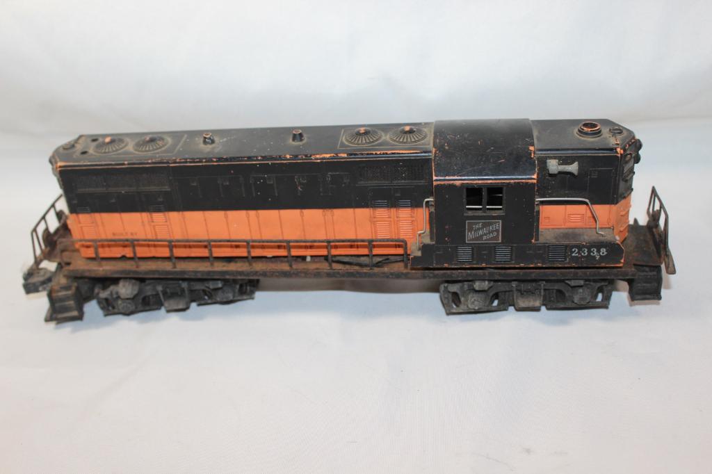 LIONEL TRAINS 2338 BLACK ORANGE MILWAUKEE LOCO: USED CONDITION. AS PICTURED