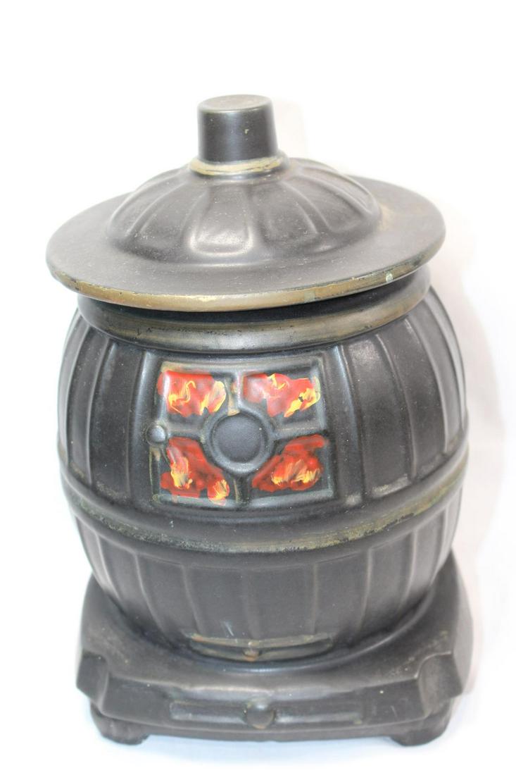 ANTIQUE MCCOY POT BELL BLACK WOOD STOVE COOKIE JAR: MEASURES APPROX. 11 BY 8 INCHES. AS PICTURED