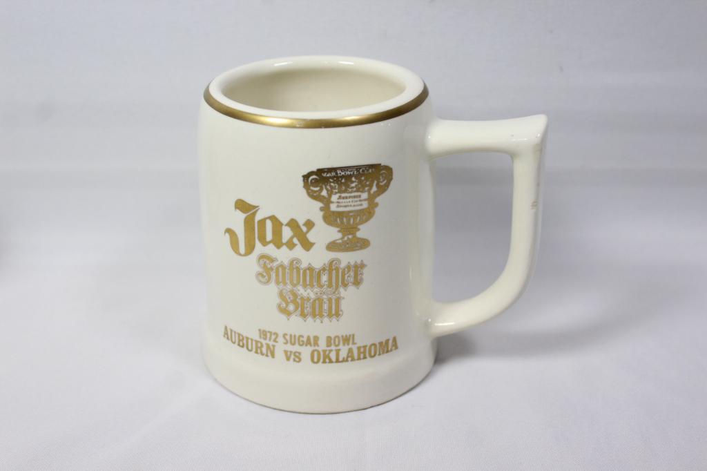 1972 Sugar Bowl Jax Stein Auburn vs Oklahoma: January 1972 Sugar Bowl Jax Beer Stein. Made by WC Bunting Co. Measures 4 1/2" tall. No chips or cracks, overall in good condition.