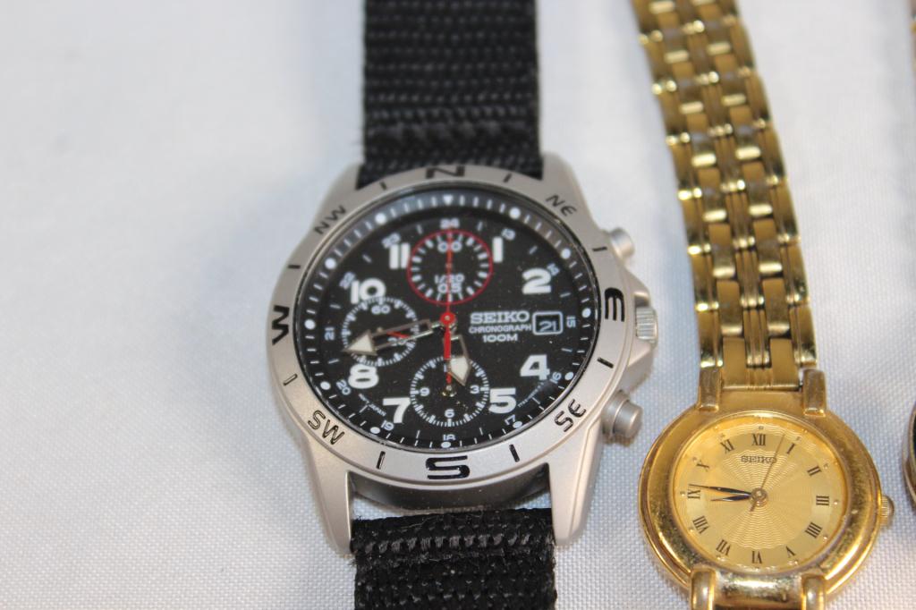 5 PC. WRIST WATCH LOT- SEIKO, ACQUA, ETC.: MENS & WOMANS SEIKO WRIST WATCHES ACQUA INDIGLO WATER RESISTANT WATCH ETC. AS PICTURED