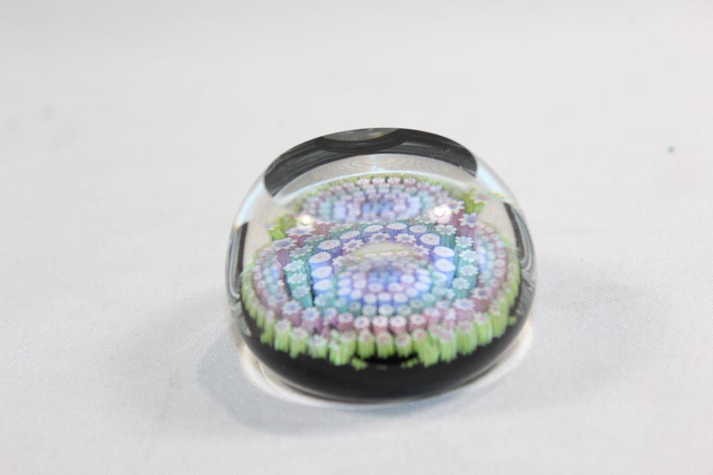 MILLEFIORI FACETED ART GLASS PAPERWEIGHT: MADE IN SCOTLAND- MEASURES APPROX. 1.5 BY 2 INCHES. NO VISIBLE CHIPS OR CRACKS, AS PICTURED