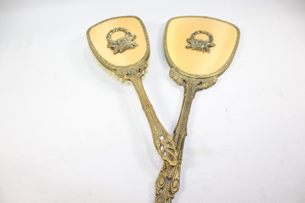 2 PC. MATCHING VANITY TOP BRUSH AND HAND MIRROR: GOLD COLORED SET- USED- NO VISIBLE DAMAGE AS PICTURED