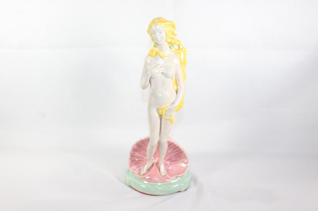 "The Birth of Venus" Porcelain Statue: Nude lady standing in clam shell- some iridescent quality to glaze. measures approx. 11 by 5 by 3.5 inches. as pictured