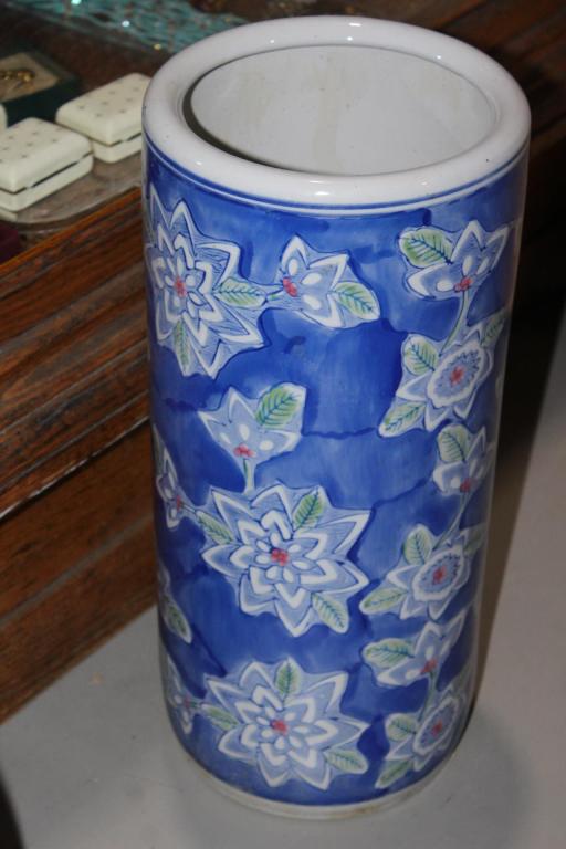 Blue & White Floral Ceramic Umbrella Stand.: Measures approx. 18 by 8 inches. No visible Damage. as pictured