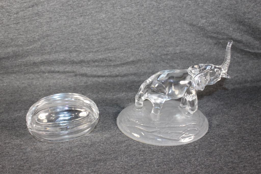Lot of Crystal Figurines: Crystal Egg Trinket Dish- Measures approx. 3 by 4 inches. Crystal Elephant Figurine. Measures approx. 5.5 by 7 inches. no visible chips or cracks. as pictured