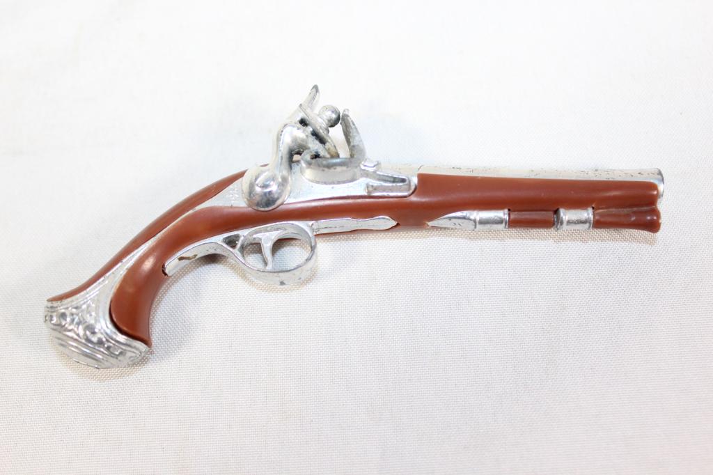 Vtg Flintlock Cap Gun: unmarked ; measures about 4 3/4 inches long, no makers mark; plastic and metal