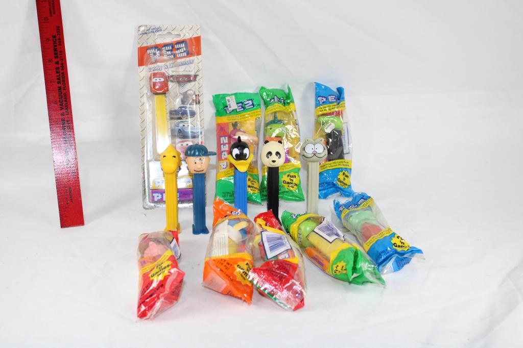 Large Lot of PEZ Dispensers - Peanuts, DAffy, etc.: as pictured