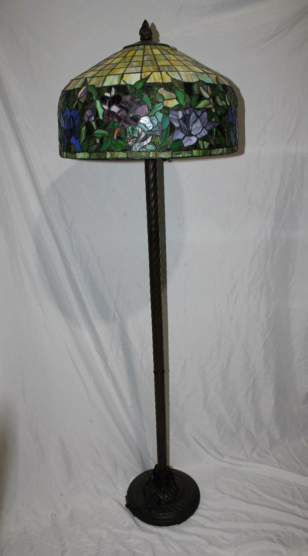 Tiffany Style Floor Lamp: measures about 67 inches all; 3 light bulbs individually operated with pull chains and floor switch, no chips or cracks, made of plastic (not glass) no conditions issues