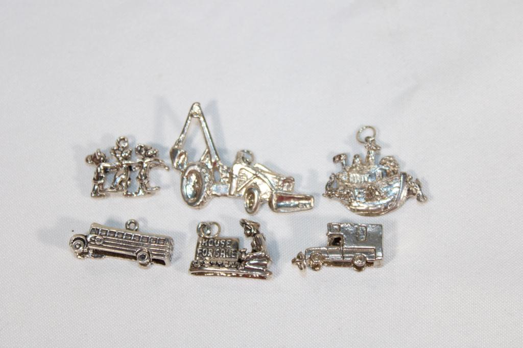 Lot of Sterling Silver Bracelet/Necklace Charms: weighs about: .99 t oz