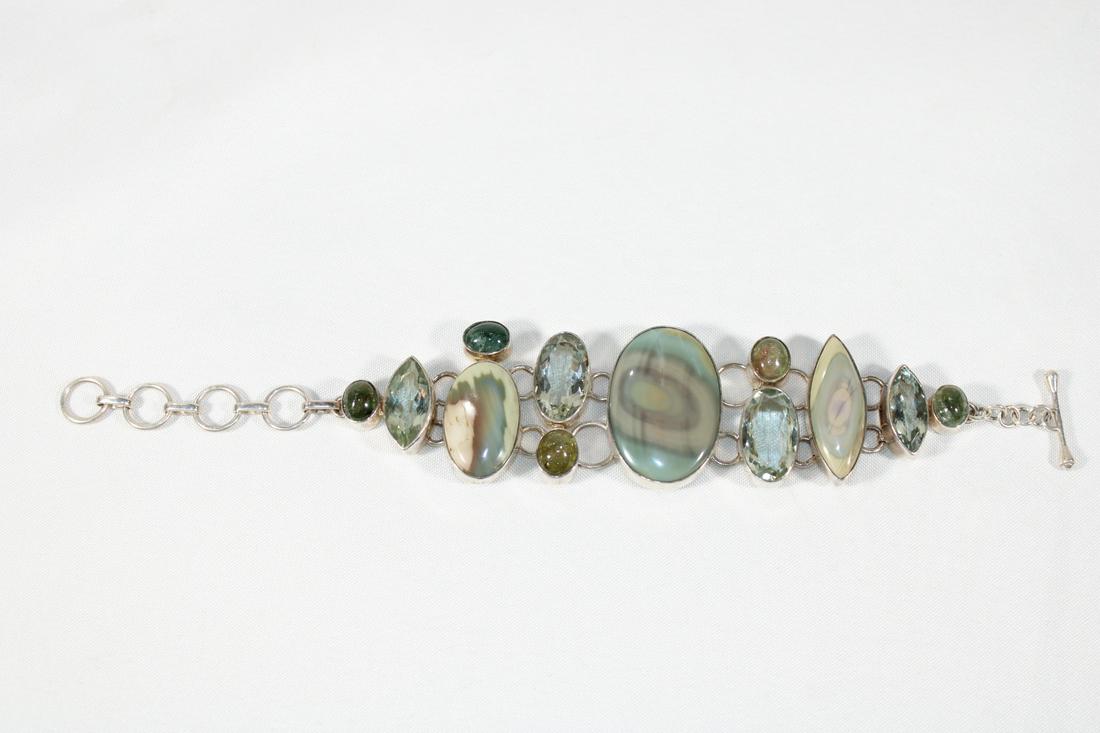 Polychrome Jasper and Gemstone Sterling Bracelet: measures about 8 1/2 inches from end to end and about 1 1/2 inches wide; with toggle end