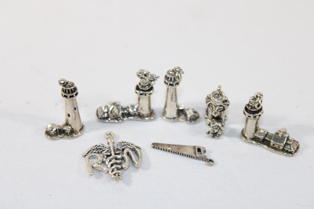 Lot of Sterling Silver Bracelet Charms: as pictured, weighs about 1.25 toz