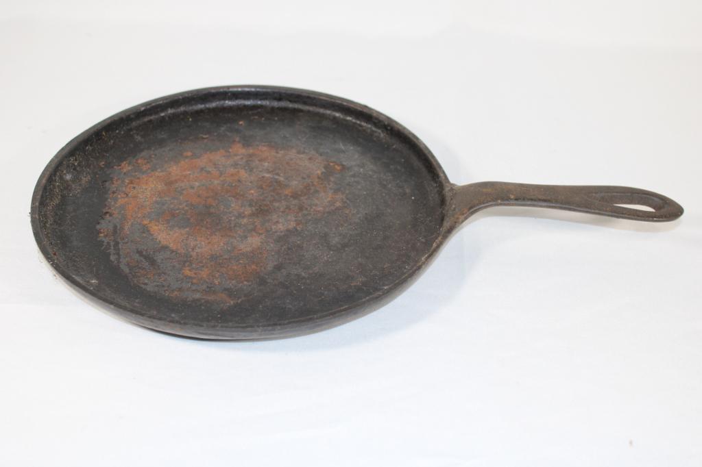 #7 Cast Iron Flat Skillet: measures about 8 3/4 inches diameter; good overall condition