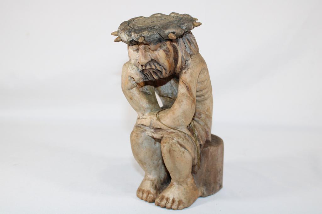 Wooden Hand Carved Statuette Pensive Jesus Christ: Vintage Polish Folk art hand carved wooden statue of Jesus. Unsigned. Good overall as pictured. Measures 8" tall.
