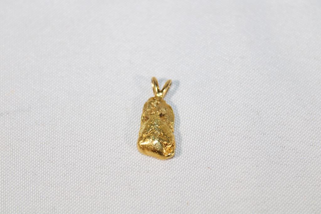 Melted Gold Nugget Pendant: unk carat, weighs about 3.59 grams