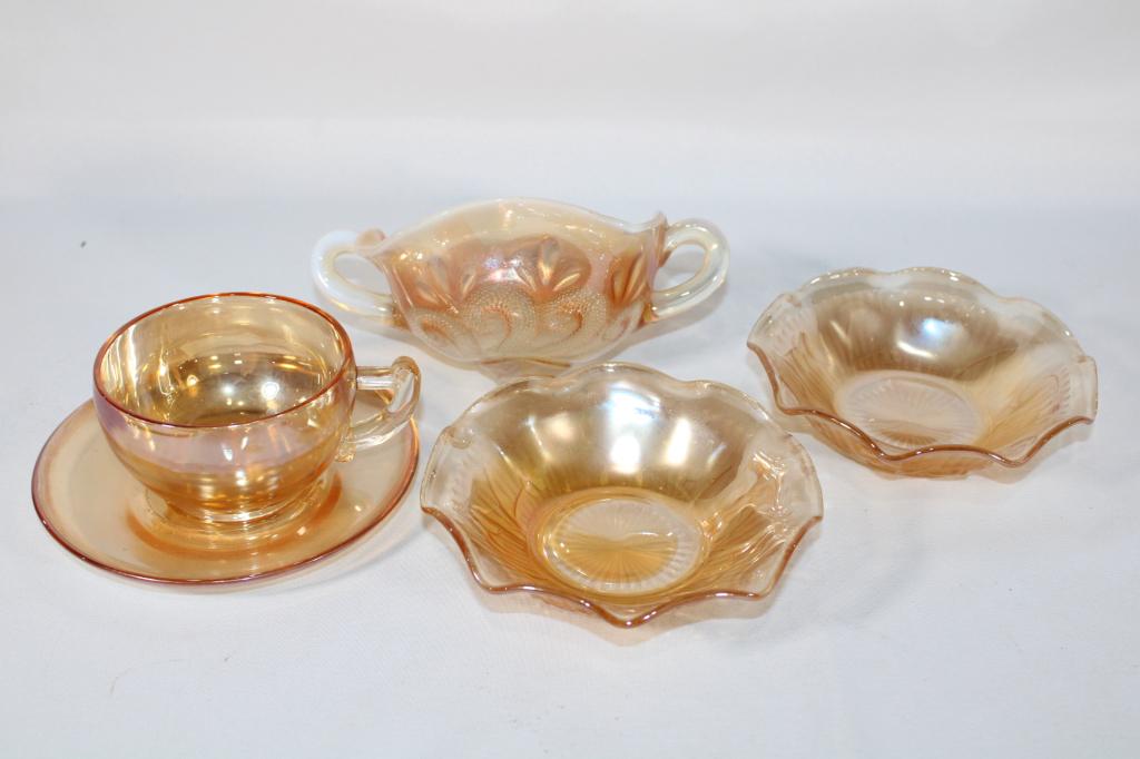Lot of Carnival Glass Bowls and Tea Cups: Good overall as pictured. The two handle bowl has had the base cut off.