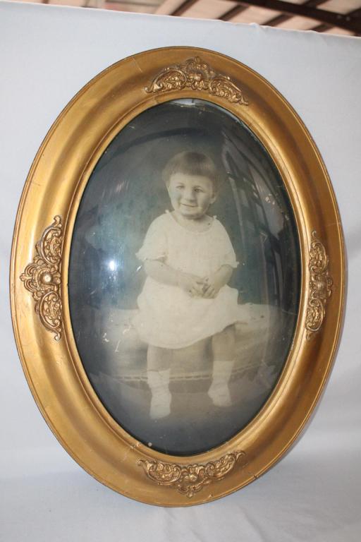 Photo of Child in Gold Framed Bubble Glass (1 of 3)