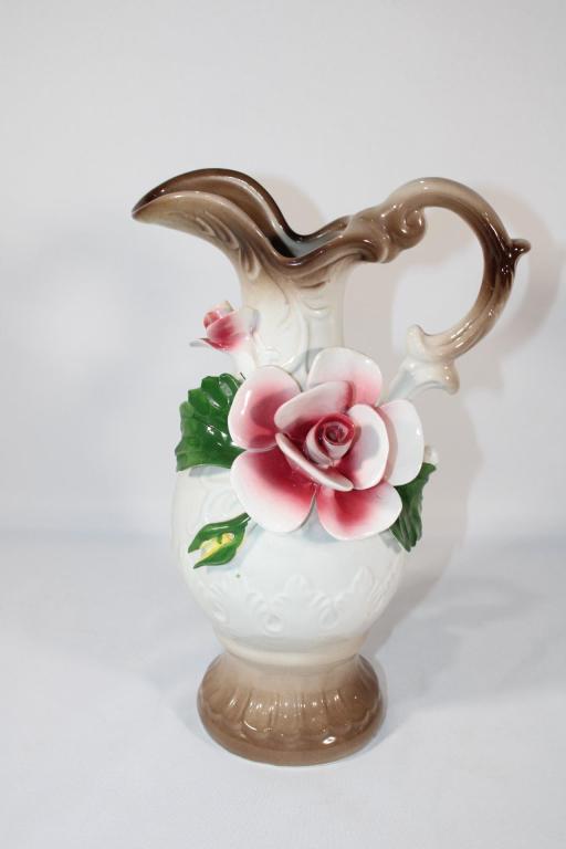 Capodimonte Porcelain Pitcher: these Lid does not fit properly, otherwise overall good as pictured. Measures about 12" tall and 17" wide. *Please view photos closely to see any Overall good as pictured. Measures about 11" tall and 