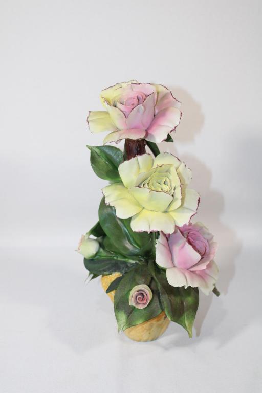 Nuova Capodimonte Bouquet of Flowers: measures about 9 1/2 inches tall; Please view photos closely to see any imperfections. The delicate nature of these pieces can have imperfections / chips, especially along the edges of the flowers. A 