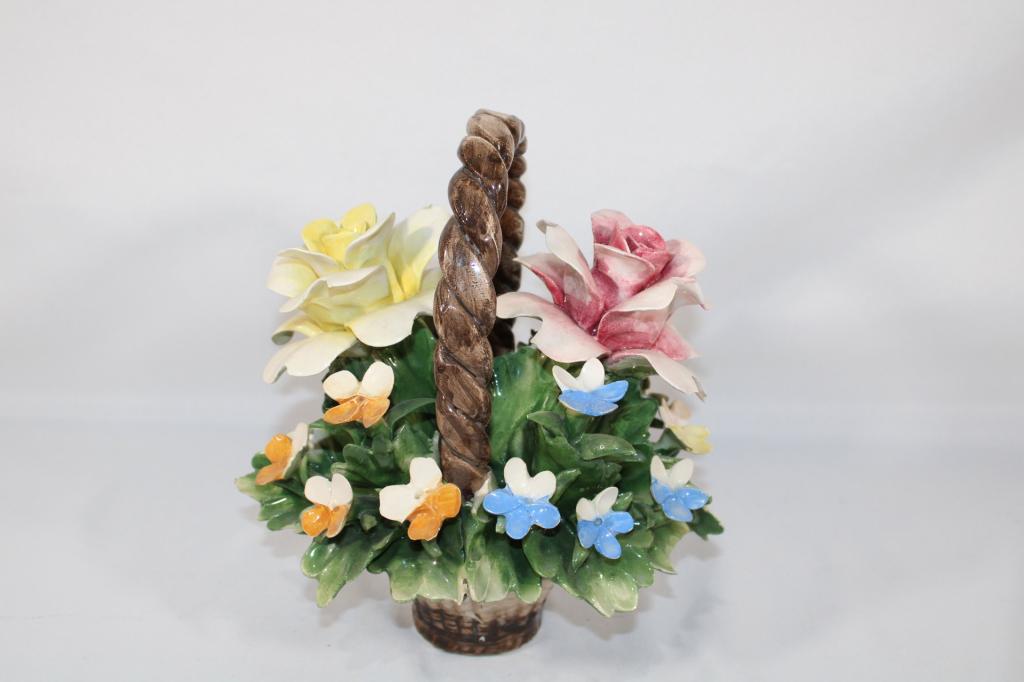 Capodimonte Porcelain Basket of Flowers: measures about 9 1/2 inches; Please view photos closely to see any imperfections. The delicate nature of these pieces can have imperfections / chips, especially along the edges of the flowers. A best 