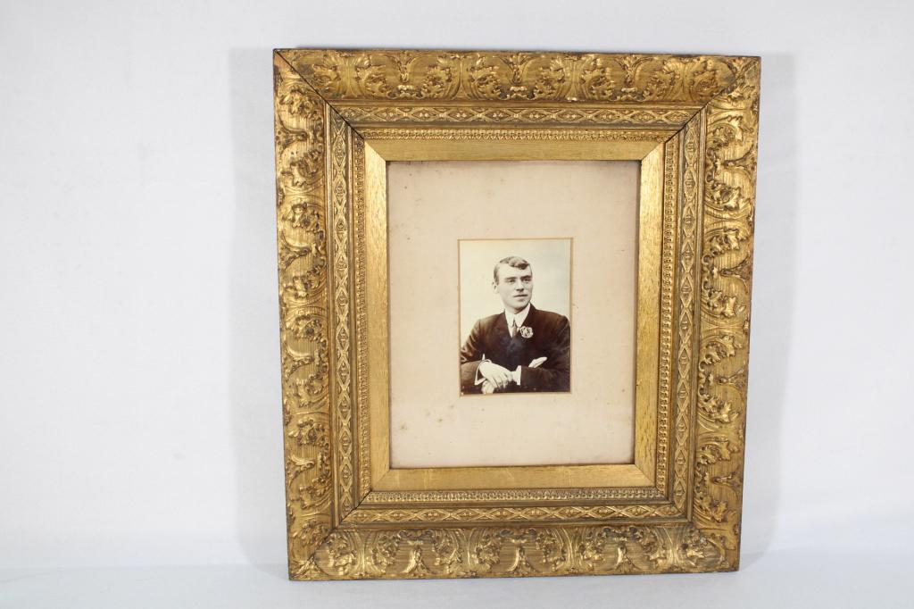 Black and White Photo in Antique Gold Frame: Good overall as pictured. Measures about 15.5" x 17.5".