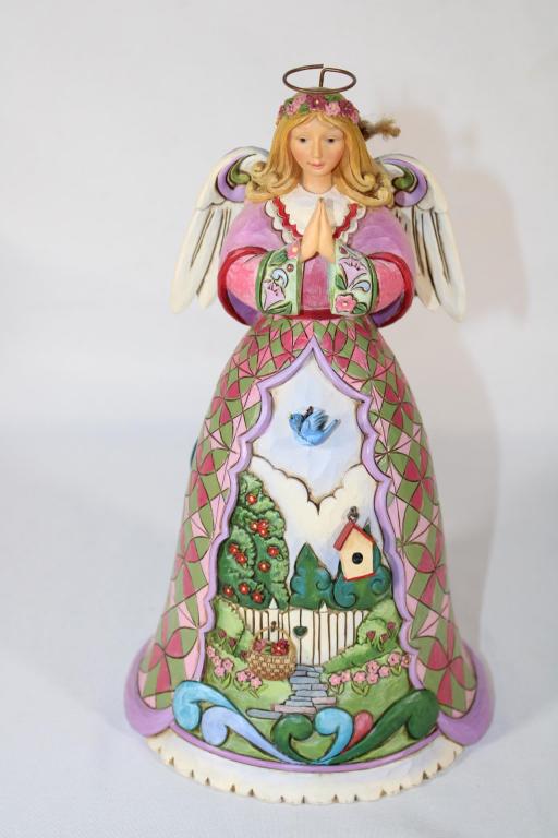 Jim Shore - Spring Renews the Spirit Figurine: measures about 10 inches tall