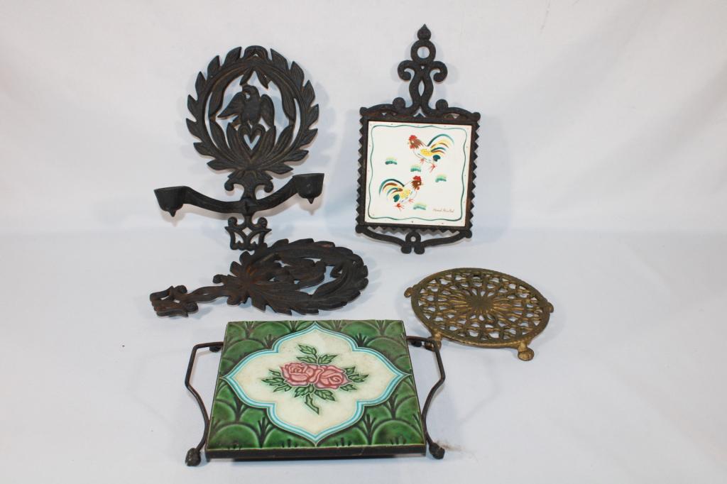 Lot of Trivets - Cast Iron Trivets, Brass, Ceramic: good overall as pictured