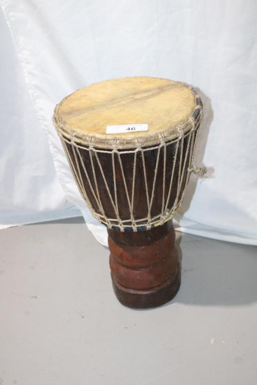 Leather Top Drum Carved From Tree Trunk: Good overall as pictured.