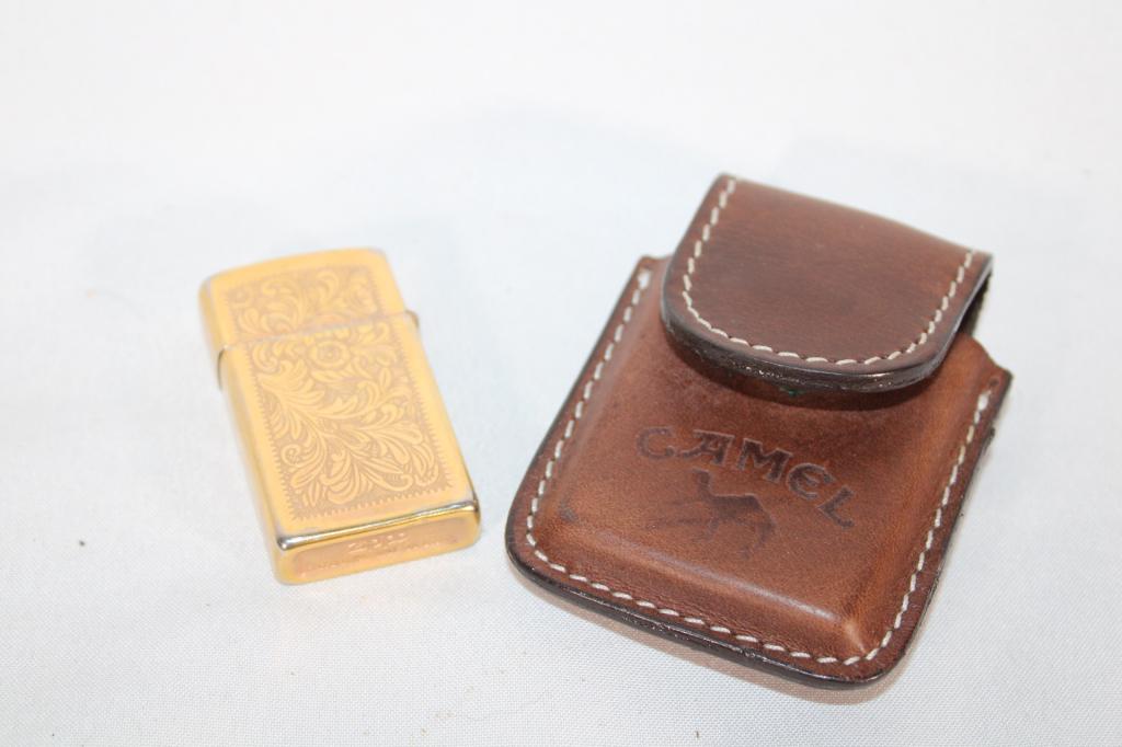 Gold Tone Zippo Lighter w/ Leather Camel Pouch: Good overall as pictured. Date code on base H XIII (1992).