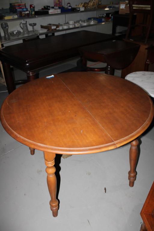 Round Wood Dining Table w/ Two Leaves: Good overall as pictured.