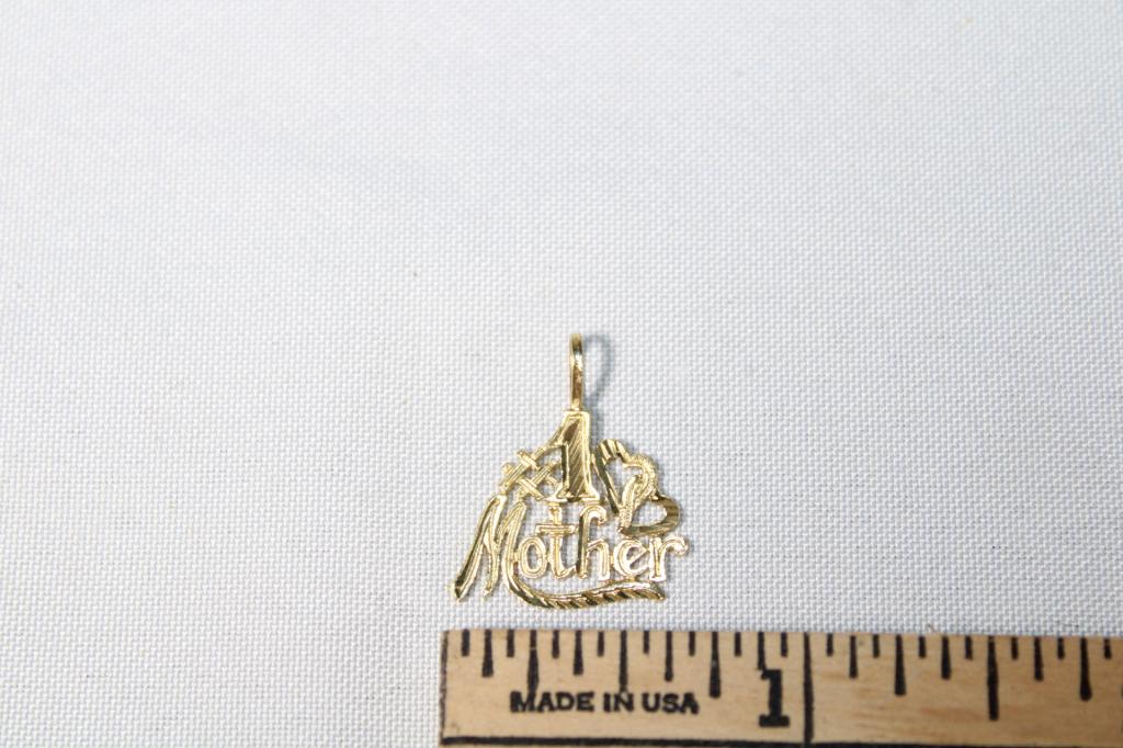14kt Gold #1 Mother Charm: Weighs .70 grams. Good overall as pictured.