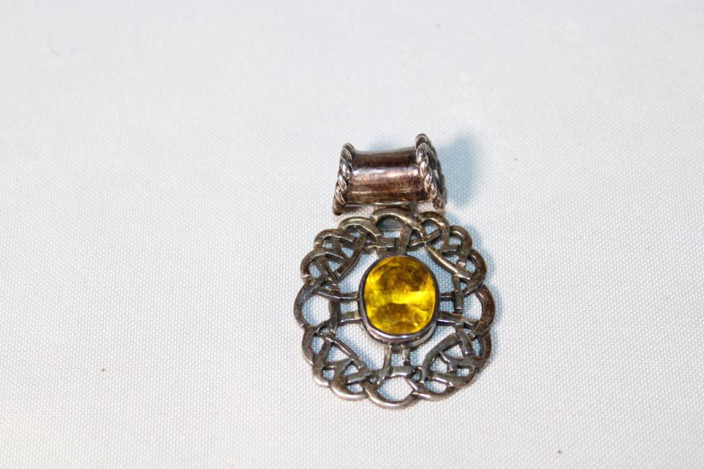 Sterling Silver Charm with Yellow Rhinestone: Weighs 0.381ozt. Good overall as pictured.