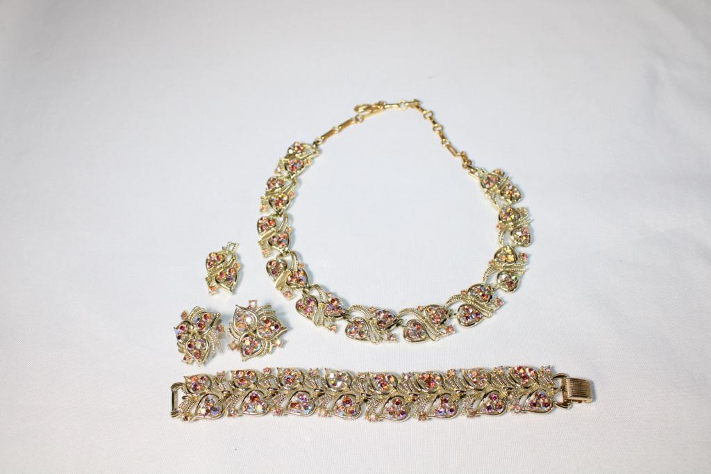 Coro Aurora Borealis Rhinestone Jewelry Set: Includes 15" Necklace, 7" bracelet, and clip on earrings. Good overall as pictured.