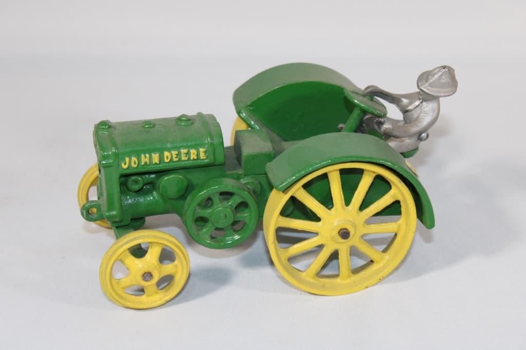 John Deere Cast Metal Tractor w/ Figure (1 of 4)