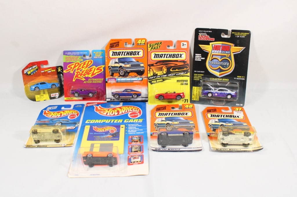 Lot of 9 Hot Wheels, Matchbox, & Racing Champions: Sealed in original packaging. Good overall as pictured.